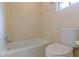 Small bathroom features a toilet and bathtub at 1737 Fontaine Dr, Jonesboro, GA 30236
