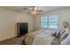 Bedroom features carpet, a ceiling fan and a large chest of drawers at 1737 Fontaine Dr, Jonesboro, GA 30236