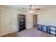 Empty bedroom with overhead fan and built in display shelves at 1737 Fontaine Dr, Jonesboro, GA 30236