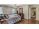 Bedroom with hardwood floors and a window letting in natural light at 1737 Fontaine Dr, Jonesboro, GA 30236