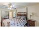 Bedroom with hardwood floors, ceiling fan, and large wardrobe at 1737 Fontaine Dr, Jonesboro, GA 30236