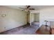 Bedroom view with ceiling fan and mirror closet doors at 1737 Fontaine Dr, Jonesboro, GA 30236