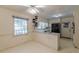 Eat-in kitchen with white cabinetry and appliances at 1737 Fontaine Dr, Jonesboro, GA 30236