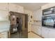 This kitchen has white cabinets and black appliances at 1737 Fontaine Dr, Jonesboro, GA 30236