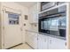 Kitchen featuring white cabinets and built in oven at 1737 Fontaine Dr, Jonesboro, GA 30236