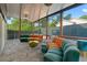 Spacious sunroom with unique couches and stunning views at 1060 Mcdaniel Sw St, Atlanta, GA 30310