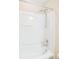 Bathroom with white shower-tub combo and chrome fixtures offering a clean and functional space at 7567 Waverly Loop, Fairburn, GA 30213