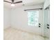 Bedroom showing a window, carpet, closet, and fan at 7567 Waverly Loop, Fairburn, GA 30213