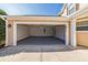 Spacious two-car garage with gray epoxy flooring and automatic door at 7567 Waverly Loop, Fairburn, GA 30213