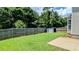 View of the well maintained back yard with wood fence at 3679 Waldrop Cliff Ln, Decatur, GA 30034