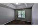 Bedroom features neutral walls, carpeted floor and natural light at 3679 Waldrop Cliff Ln, Decatur, GA 30034