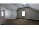Bonus room features vaulted ceilings, carpeted floor and natural light at 3679 Waldrop Cliff Ln, Decatur, GA 30034