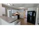 Spacious kitchen with plenty of counter space, modern appliances, wood-look flooring, and a convenient layout at 3679 Waldrop Cliff Ln, Decatur, GA 30034