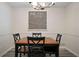 Classic dining room features modern lighting and a decorative message board at 5070 Maryland Nw Dr, Acworth, GA 30101