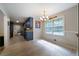 Bright kitchen featuring blue cabinets, granite countertops, and stainless steel appliances at 5070 Maryland Nw Dr, Acworth, GA 30101