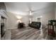 Comfortable living room with new flooring, a fireplace, and a view to the backyard at 5070 Maryland Nw Dr, Acworth, GA 30101
