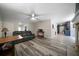 Open-concept living room, offering a view to the kitchen, with ample seating and modern finishes at 5070 Maryland Nw Dr, Acworth, GA 30101
