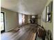 Inviting living room featuring hardwood floors, a cozy fireplace, and an abundance of natural light at 2275 Chestnut Log Loop, Lithia Springs, GA 30122
