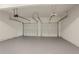 Spacious garage features ample room for two cars and storage at 70 Trinity Lane, Covington, GA 30016