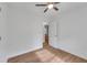 Simple room with ceiling fan, and open door showing room next door at 1834 Stroud Road, Mcdonough, GA 30252