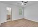 Light-filled bedroom with window and access to a bathroom at 1834 Stroud Road, Mcdonough, GA 30252