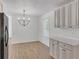 Bright eat-in kitchen area features modern lighting and sleek countertops at 1834 Stroud Road, Mcdonough, GA 30252