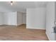 Bright, freshly-painted living room with modern vinyl flooring and ample natural light at 1834 Stroud Road, Mcdonough, GA 30252