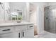 Modern bathroom featuring a marble floor and glass enclosed shower at 301 Retreat Way, Carrollton, GA 30116