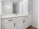 Bathroom with white cabinets and hardware with plenty of storage at 301 Retreat Way, Carrollton, GA 30116