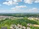 Serene community surrounded by lush trees and greenery creating a private and tranquil setting for the homes at 6415 Yellow Birch St, Cumming, GA 30040
