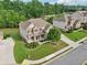 Desirable two-story home with a lovely front lawn in a beautiful and well-maintained neighborhood at 6415 Yellow Birch St, Cumming, GA 30040