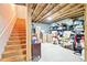 Unfinished basement provides ample storage or customization with stair access to the main living areas at 6415 Yellow Birch St, Cumming, GA 30040