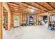 Large unfinished basement offers customization possibilities, and features a convenient walk-out door to the yard at 6415 Yellow Birch St, Cumming, GA 30040