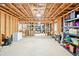 Massive unfinished basement with exposed ceilings provides a blank slate for your future home improvements at 6415 Yellow Birch St, Cumming, GA 30040