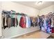 Large walk-in closet with ample hanging space and shelving for organizing clothing and accessories at 6415 Yellow Birch St, Cumming, GA 30040