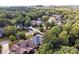 Beautiful aerial of a leafy neighborhood featuring a mix of well-maintained homes at 216 Crescent Moon Way, Canton, GA 30114