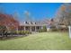 Charming home featuring a well-manicured lawn and inviting front porch, perfect for curb appeal at 216 Crescent Moon Way, Canton, GA 30114