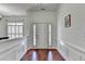 Inviting entryway with wood floors, classic trim, and a front door flanked by sidelights at 337 Inverness Ave, Mcdonough, GA 30253