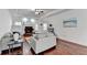 Inviting living room with hardwood floors, fireplace, and neutral color palette at 337 Inverness Ave, Mcdonough, GA 30253