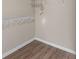Walk-in closet featuring built-in shelving and ample storage space at 971 Reap Ln, Lawrenceville, GA 30043