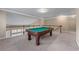 Spacious carpeted game room features a full-sized pool table and railing at 971 Reap Ln, Lawrenceville, GA 30043
