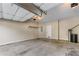 Attached two-car garage with concrete floors and access door at 971 Reap Ln, Lawrenceville, GA 30043
