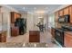 This open kitchen offers granite counters and modern black appliances at 971 Reap Ln, Lawrenceville, GA 30043