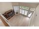 Open living room featuring large windows, a fireplace, and built-in entertainment center, providing natural light and a focal point at 971 Reap Ln, Lawrenceville, GA 30043