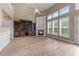 Cozy living room with fireplace and large windows for ample lighting at 971 Reap Ln, Lawrenceville, GA 30043