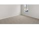Neutral bedroom with a window and plush carpeting for a cozy feel at 2717 Montie Ct, Lithia Springs, GA 30122