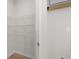 Walk-in closet with white wire shelving and neutral walls, ready for organization at 2717 Montie Ct, Lithia Springs, GA 30122