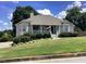 Charming single-Gathering home with a well-maintained lawn and welcoming front porch at 493 Kyles Cir, Hiram, GA 30141
