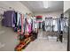 Spacious walk-in closet with organized shelving and ample storage, offering a practical and tidy solution for clothing at 11352 Musette Cir, Alpharetta, GA 30009