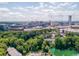 Scenic aerial view featuring a cityscape, surrounding greenery, and lake at 2442 Crescent Park Ct, Atlanta, GA 30339